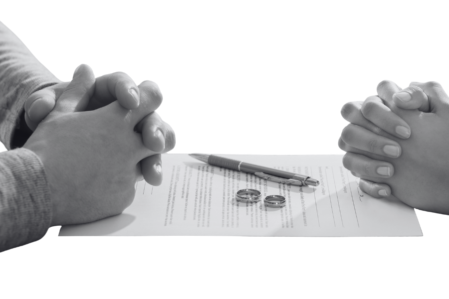 Couple signing stipulated divorce documents with attorney guidance – peaceful agreement process at DoUsPart Divorce